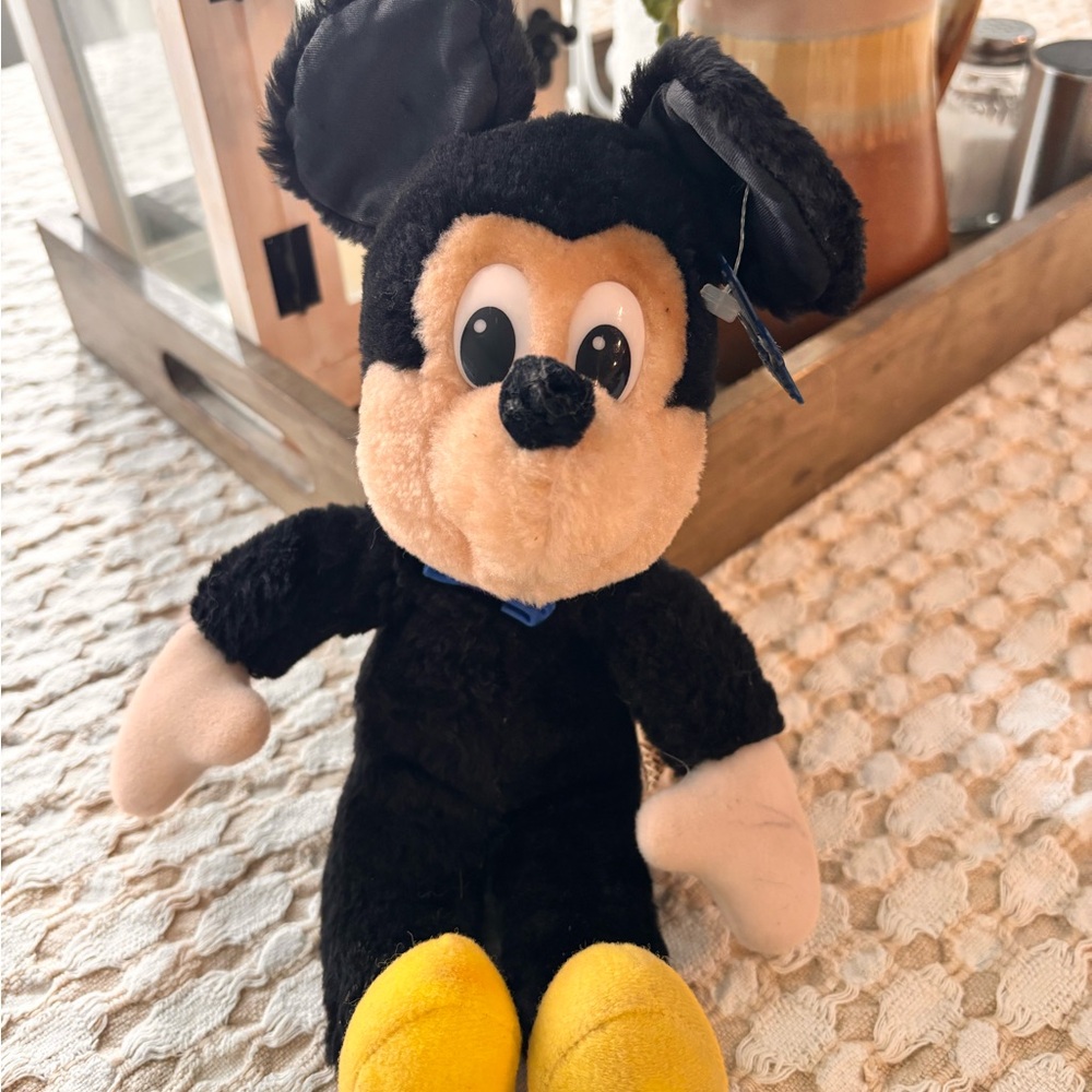 Black and Yellow Stuffed Animal with Iconic Ears